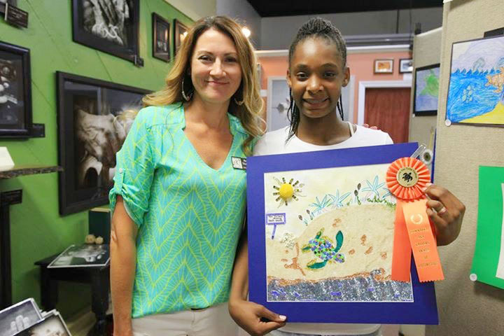 Alaysia Fernandez, pictured with Heidi Thamert of The Downtown Art Gallery.�